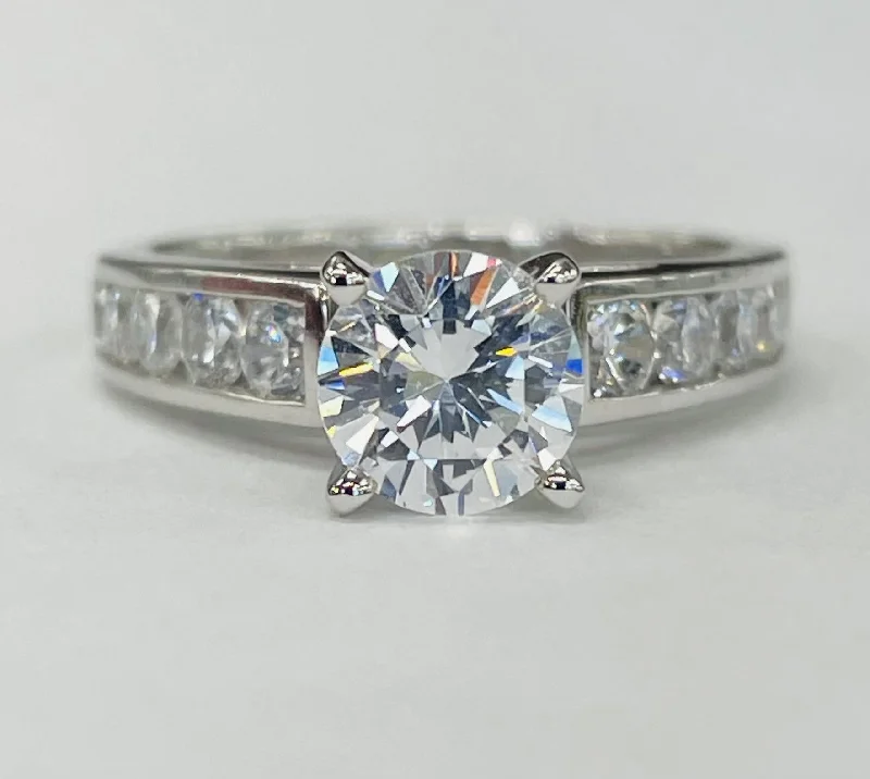 trendy round-cut engagement rings-Romance - Simple Channel Set Diamond Setting