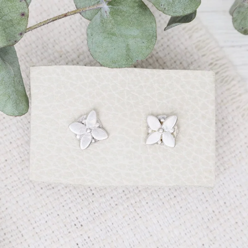 women’s custom drop earrings-Matte Silver Geometric Floral Stud Earrings