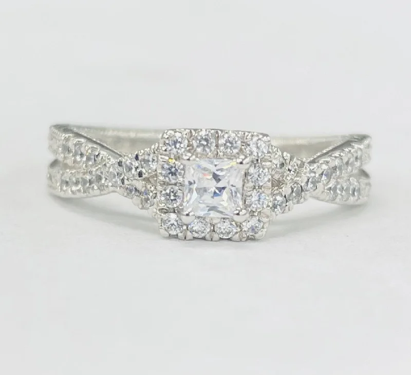 delicate engagement rings with diamonds-Romance - Detailed And Dainty Halo Diamond Twist Setting