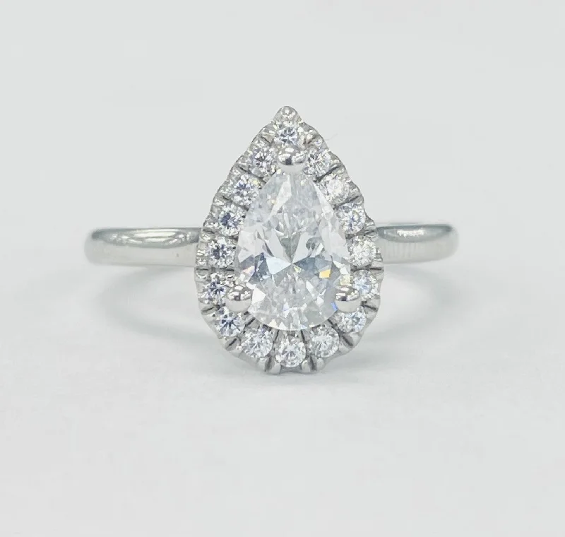 three-stone engagement rings for women-Romance - Solitare Pear Halo Diamond Setting