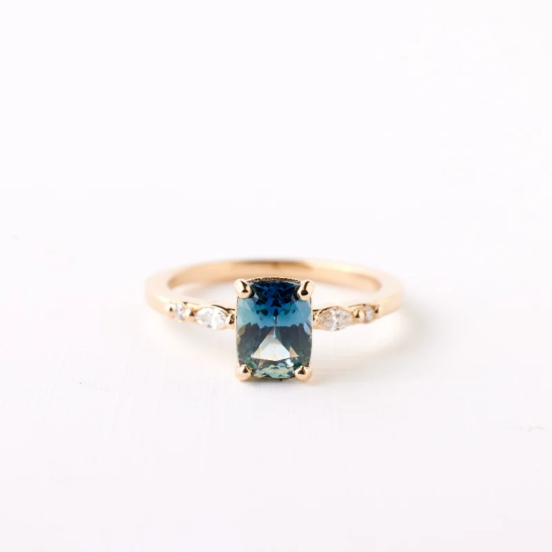 classic engagement rings with colored stones-Nova Ring - 1.63 Carat Blue Teal Parti Cushion Sapphire