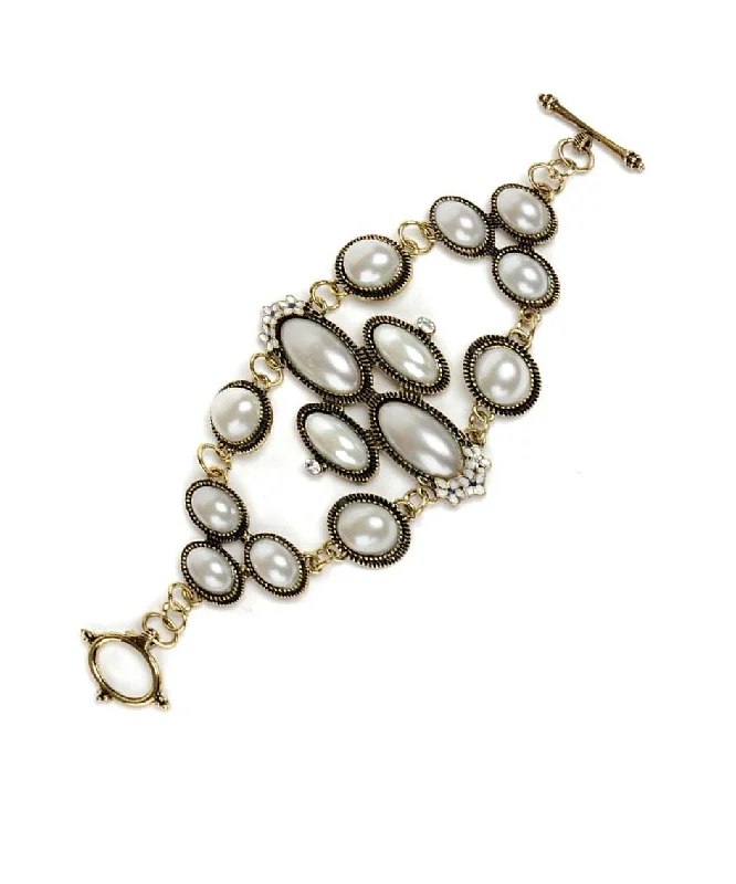 women’s trendy bangle-Gold-Plated Alloy Pearl Studded Designer Bracelet - The Pari